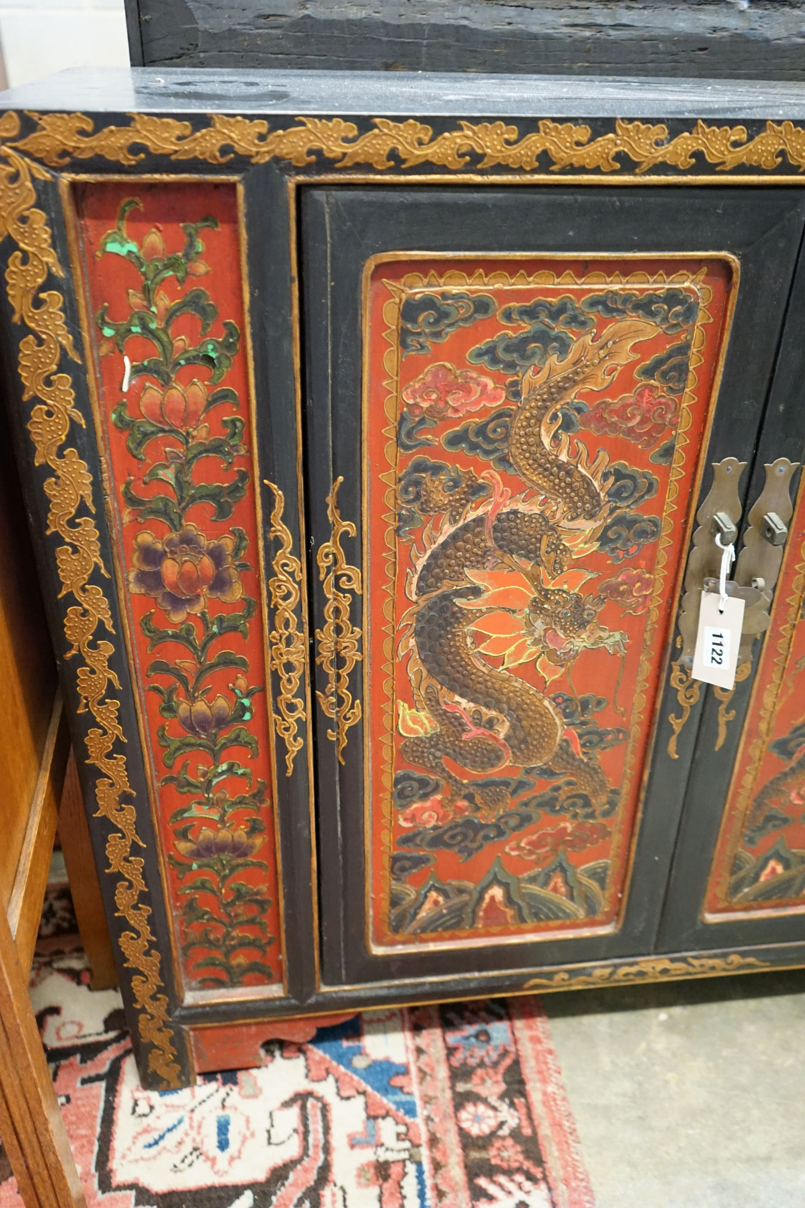 A Chinese lacquer two door side cabinet, width 100cm, depth 38cm, height 86cm